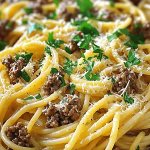 To make Beef and Garlic Butter Pasta, gather these fresh items: - 250g spaghetti or your preferred pasta - 300g ground beef - 4 tablespoons unsalted butter - 5 cloves garlic, finely minced - 1 small onion, chopped finely - 1 teaspoon dried oregano - 1 teaspoon chili flakes (optional for a kick) - Salt and freshly ground black pepper to taste - ½ cup grated Parmesan cheese - Fresh parsley, chopped (for garnish) - Zest of 1 lemon While spaghetti is a classic choice, you can use other types of pasta too. I love fettuccine for its wide texture. Penne holds sauce well, making it a great option. If you're feeling adventurous, try pappardelle for a fun twist. Remember, choose pasta that cooks to an al dente texture for the best bite. Fresh herbs bring bright flavors to your dish. I recommend using fresh parsley and oregano if you can find them. They add a burst of freshness. Dried herbs work too and provide convenience. Use one teaspoon of dried oregano if fresh is not available. Just remember, dried herbs have a stronger taste. Adjust the amount to suit your preference. Start by filling a large pot with water. Add a good amount of salt. Bring the water to a boil. Once boiling, add 250g of spaghetti or your favorite pasta. Stir it gently to keep it from sticking. Cook according to the package instructions until it is al dente. When it's done, save 1 cup of the starchy water, then drain the pasta. This water will help make the sauce creamy. In a large skillet, heat 2 tablespoons of butter over medium heat. Once melted, add 1 small chopped onion and 5 finely minced garlic cloves. Sauté them for about 3 minutes. You want the onion to turn soft and clear. The garlic should smell nice and fragrant. This step builds flavor for your dish. Now, raise the heat to medium-high. Add 300g of ground beef to the skillet. Use a spatula to break it apart as it cooks. Cook for about 5-7 minutes until the beef is brown. If you see too much fat, be careful and drain it off. Then, sprinkle in 1 teaspoon of dried oregano, chili flakes if you want heat, and a good pinch of salt and pepper. Stir it all together and let it cook for another 1-2 minutes to blend the flavors. For the complete recipe, check the [Full Recipe]. To get the right pasta texture, cook your pasta until al dente. This means it should be firm but not hard. Use a large pot with plenty of salted water. This helps the pasta cook evenly. Remember to stir it often. After cooking, save some pasta water. This starchy water helps to make your sauce creamy. You can boost the flavor of your dish with a few simple extras. Adding fresh herbs like basil or thyme makes it fresh. A splash of lemon juice brightens the dish. You can also toss in some sautéed mushrooms or spinach for added nutrition. If you love spice, try adding more chili flakes. Each of these tweaks can take your pasta to the next level. One common mistake is overcooking the pasta. Always check the cooking time on the package. Another mistake is not seasoning enough. A little salt in the cooking water and while cooking the beef goes a long way. Lastly, don’t skip the cheese! It adds rich flavor. Follow these tips for perfect beef and garlic butter pasta every time. For the full recipe, check the link above. {{image_4}} You can boost the healthiness of your Beef and Garlic Butter Pasta by adding vegetables. Veggies add color and nutrients. Consider adding spinach, bell peppers, or zucchini. Just chop them small and sauté them with the onions and garlic. They will soften and blend well with the dish. This not only makes it healthier but also adds a nice crunch. If you want to change things up, try using different proteins. Ground turkey or chicken work great instead of beef. You can also use shrimp or tofu for a lighter meal. Each protein brings its unique flavor. Adjust the cooking time based on what you choose. For shrimp, cook until they turn pink, which takes about 3-4 minutes. For those who love heat, making the dish spicy is easy. You can add more chili flakes or even some sliced fresh jalapeños. Another option is to use spicy sausage instead of ground beef. This will give your pasta a bold kick. Just remember, spice levels vary. Start with a small amount and taste as you go. You can store leftover Beef and Garlic Butter Pasta in the fridge. Place it in an airtight container. It stays fresh for up to three days. Make sure to cool it down before sealing the container. This helps keep the pasta from getting mushy. If you want to save the pasta for later, freezing works great. Place the cooled pasta in freezer-safe bags or containers. Remove as much air as possible to avoid freezer burn. It can last in the freezer for about two months. When ready to eat, thaw in the fridge overnight. To reheat, you have a few options. For the best taste, use the stove. Add a splash of water or broth in a skillet over low heat. Stir often until it’s hot. You can also microwave it. Place the pasta in a bowl and cover it with a damp paper towel. Heat in short bursts, stirring in between, until warmed through. Enjoy your Beef and Garlic Butter Pasta just as delicious as the first time! For the full recipe, check the earlier section. To make this dish gluten-free, use gluten-free pasta. Many brands offer great options that taste good. Ensure all sauces and seasonings are also gluten-free. This way, you can enjoy the same great flavors without gluten. Yes, you can use any pasta you like! Penne, fusilli, or even zucchini noodles work well. Each type will give a new twist to the dish. Choose your favorite for a fun meal. This pasta pairs well with a simple salad or garlic bread. You can also serve it with steamed veggies for a healthy side. A light wine or sparkling water can enhance the meal. You can prepare the beef and garlic butter sauce ahead of time. Just cook it as usual, let it cool, and store it in the fridge. When you’re ready to eat, just cook the pasta and mix everything together. Absolutely! This dish is great for meal prep. You can store servings in airtight containers. It stays tasty for up to three days in the fridge. Just reheat it in the microwave or on the stovetop for a quick meal. For the full recipe, check the details above. In this blog post, we explored the key ingredients, step-by-step cooking, and helpful tips for Beef and Garlic Butter Pasta. We covered everything from fresh herbs to cooking techniques. Remember, you can easily customize the dish by adding veggies or changing the protein. Always aim to avoid common mistakes for the best results. With these guidelines, you can store or reheat your dish perfectly. Enjoy the process and create a meal that your whole family will love. Happy cooking!