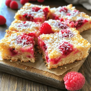 To make Raspberry Coconut Squares, you need a few key items: - 1 cup almond flour - 1 cup shredded unsweetened coconut - 1/2 cup honey or maple syrup - 1/4 cup melted coconut oil - 2 cups fresh raspberries - 1 teaspoon vanilla extract - 1/4 teaspoon salt - 1/4 teaspoon baking powder These ingredients create a tasty and chewy base with a sweet layer of raspberries on top. The almond flour gives a nice nutty flavor, while the shredded coconut adds texture. You can add a bit of crunch by including: - 1/4 cup chopped nuts (e.g., almonds or walnuts) These nuts not only enhance the flavor but also give the squares a delightful bite. Feel free to mix and match based on your tastes! If you want to tweak the recipe, consider these swaps: - Use oat flour instead of almond flour for a gluten-free version. - Replace honey or maple syrup with agave syrup for a vegan option. - For those avoiding coconut, you can use sunflower seeds instead of shredded coconut. These modifications help you create a version that fits your dietary needs while still being delicious. Don't be afraid to experiment! For the complete recipe, check out the Full Recipe section. Start by preheating your oven to 350°F (175°C). Grab an 8x8 inch baking pan and line it with parchment paper. Make sure to leave some paper hanging over the edges. This will help you lift the squares out later. In a large mixing bowl, add the almond flour, shredded coconut, salt, and baking powder. Use a whisk or spoon to mix them together well. This step helps ensure every bite is full of flavor. In another bowl, whisk together the melted coconut oil, honey or maple syrup, and vanilla extract. Mix until smooth. This blend adds sweetness and richness to your squares. Pour the wet mixture into the dry ingredients. Stir until you form a cohesive dough. If you like, fold in the chopped nuts for extra crunch. Next, press the dough evenly into the bottom of your prepared pan. Gently place the fresh raspberries on top. Press some into the dough for a burst of flavor. Now, place your pan in the preheated oven. Bake for about 25-30 minutes. You want the edges to be golden brown and the raspberries to bubble. After baking, let the pan cool for 15 minutes. Lift the squares out using the overhanging parchment paper. Move them to a wire rack to cool completely. Then, cut into 16 squares and enjoy this tasty treat! To get the right texture, use almond flour. It makes the base soft yet firm. Press the dough well into the pan. This helps it hold together. Bake until the edges are golden brown. This step ensures a nice, crispy edge. For a flavor boost, add vanilla extract. It pairs well with raspberries. You can also mix in chopped nuts. They add a great crunch. Try almonds or walnuts for extra taste. If you want a tropical twist, add a splash of lime juice. It brightens the flavors. If your squares fall apart, check your dough. Did you press it enough? If they are too dry, try adding more coconut oil. This keeps them moist. For overbaking, watch your oven closely. Baking times can vary. Use the toothpick test to check doneness. If it comes out clean, they are ready. {{image_4}} You can switch up the fruit in this recipe. Try blueberries, strawberries, or blackberries. Each fruit brings its own unique taste. Blueberries add a sweet burst, while strawberries give a juicy flavor. You can also mix fruits for a fun twist. To make these squares nut-free, replace almond flour with sunflower seed flour. Use maple syrup to keep it vegan. You can use coconut oil for moisture and flavor. This way, you still get a great taste without nuts. For gluten-free options, always check your ingredients. Almond flour is already gluten-free, so you’re good there. You can use gluten-free oats instead of flour for a chewy texture. This makes the squares safe for anyone with gluten issues. If you're interested in more ideas, check the Full Recipe. To keep your Raspberry Coconut Squares fresh, store them in an airtight container. This helps retain their moisture and flavor. Place a piece of parchment paper between layers to prevent sticking. Keep them at room temperature for up to three days. If you want them to last longer, refrigerate them. They can last up to a week in the fridge. If you want to enjoy these squares later, freezing is a great option. First, let them cool completely. Then, wrap each square in plastic wrap. Place the wrapped squares in a freezer-safe bag or container. They can stay frozen for up to three months. When you're ready to enjoy them, just take out the number of squares you want. To serve, simply take the squares out of the fridge or freezer. If they're cold, let them sit at room temperature for a few minutes. You can also warm them up slightly in the microwave. Heat them for about 10-15 seconds to keep them soft. Enjoy them as is or pair them with a scoop of ice cream for a special treat! To make Raspberry Coconut Squares vegan, simply replace honey with maple syrup. Use any plant-based oil instead of coconut oil. This change keeps the squares sweet and moist. You can follow the Full Recipe for exact measurements. Yes, frozen raspberries work well in this recipe! Just thaw them before use. They may release more juice than fresh ones, making the squares a bit wetter. Adjust the baking time if needed, as the extra liquid may affect cooking. The best way to cut the squares is to use a sharp knife. First, let them cool completely on a wire rack. Then, lift them out using the parchment paper. Cut them into equal squares for a nice presentation. Raspberry Coconut Squares last for about four days at room temperature. Store them in an airtight container to keep them fresh. If you want to enjoy them later, you can freeze them for up to three months. Raspberry Coconut Squares are easy and fun to make. We covered the key ingredients, from required items to custom choices. You learned step-by-step how to prepare and bake. I shared helpful tips for texture and taste, plus neat variations to try. Remember to store your squares properly for the best enjoyment. I hope you feel ready to bake and share these tasty treats! You’ll delight in making them again and again. Enjoy!