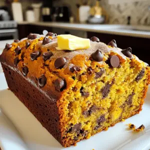 To make pumpkin chip banana bread, gather these key ingredients: - 1 cup ripe bananas, mashed (about 2-3 medium bananas) - 1 cup pumpkin puree (canned or freshly made) - 1/2 cup granulated sugar - 1/2 cup brown sugar, packed - 1/2 cup vegetable or melted coconut oil - 2 large eggs, at room temperature - 1 teaspoon pure vanilla extract - 2 cups all-purpose flour, sifted - 1 teaspoon baking soda - 1/2 teaspoon fine salt - 1 teaspoon ground cinnamon - 1/2 teaspoon ground nutmeg - 1 cup semi-sweet or dark chocolate chips - 1/2 cup chopped walnuts or pecans (optional) These ingredients create a moist and flavorful bread with hints of pumpkin and banana. The chocolate chips add a sweet touch, making every bite delightful. You can customize your pumpkin chip banana bread with these optional add-ins: - Dried cranberries for a tart contrast - Shredded coconut for a chewy texture - Chopped apples for extra sweetness - A scoop of peanut butter for a nutty twist These add-ins can boost flavor and texture, making your bread unique and fun to eat. If you have allergies, don't worry! Here are some easy substitutions: - Use a flax egg instead of regular eggs for a vegan option. - Substitute gluten-free flour for all-purpose flour to make it gluten-free. - Replace granulated sugar with coconut sugar or a sugar alternative if needed. - Use applesauce instead of oil for a lower-fat version. These swaps keep the taste good while making the recipe safer for everyone. You can find the full recipe in the main article to get started on this delicious treat! Start by preheating your oven to 350°F (175°C). This step helps your bread bake evenly. Next, take a 9x5-inch loaf pan. Grease it well with butter or oil. You can also line it with parchment paper. This makes it easy to remove the bread later. In a big bowl, add the ripe bananas. Mash them well until they are smooth. Then, add pumpkin puree to the bowl. You can use canned or fresh pumpkin. Next, mix in the granulated sugar and brown sugar. Then, pour in the vegetable oil or melted coconut oil. This adds a nice flavor. Now, crack in the eggs and add vanilla extract. Whisk everything together until it is creamy and smooth. In another bowl, combine the all-purpose flour, baking soda, salt, ground cinnamon, and ground nutmeg. Sift these dry ingredients together to prevent clumps. Slowly add the dry mix to the wet ingredients. Use a spatula to fold them together gently. Be careful not to over-mix. This keeps the bread light and fluffy. Finally, fold in the chocolate chips and nuts if you choose to use them. Pour the batter into your prepared loaf pan. Use a spatula to smooth the top. Place the pan in your preheated oven. Bake for 60 to 70 minutes. To check if it's done, insert a toothpick into the center. It should come out clean or have a few moist crumbs. Once baked, take the loaf out and let it cool in the pan for 10 to 15 minutes. After that, move it to a wire rack to cool completely before slicing. Enjoy your delicious Pumpkin Chip Banana Bread! For the full recipe, check out the detailed instructions above. To get the best texture in your pumpkin chip banana bread, use ripe bananas. Ripe bananas are soft and sweet. They add moisture and flavor. Mash them well until smooth. This helps the batter mix evenly. When you add the dry ingredients, mix gently. Over-mixing makes the bread tough. You want a soft, moist loaf. Also, keep an eye on the baking time. A perfectly baked loaf will have a golden-brown top. One big mistake is using unripe bananas. They will not give the bread enough sweetness. Another mistake is not measuring the flour correctly. Too much flour makes the bread dense. Make sure to spoon the flour into the measuring cup, then level it off. A third mistake is skipping the cooling time. Cutting the bread too soon can make it crumble. Let it cool for at least 10 minutes in the pan. If your bread is underbaked, check your oven temperature. An oven that runs cool may need more time. Use a toothpick to test doneness. If it comes out wet, bake a little longer. If the bread is overbaked, it may be too dry. Check your baking time closely. Use a timer to avoid this. If you notice the top browning too fast, cover it with foil. This will help it bake evenly without burning. For the full recipe, refer to the complete guide on making pumpkin chip banana bread. {{image_4}} You can make a vegan version of pumpkin chip banana bread. Replace eggs with flaxseed meal. Use one tablespoon of flaxseed meal mixed with three tablespoons of water for each egg. Let it sit for five minutes until it thickens. You can also swap the sugar for coconut sugar. Use plant-based oil or applesauce to keep it moist. This version tastes just as good and keeps everyone happy. To make gluten-free pumpkin chip banana bread, substitute regular flour with a gluten-free blend. Look for blends that contain xanthan gum, as this helps with texture. You may need to adjust the liquid slightly since gluten-free flour can absorb more moisture. Use the same amount of mashed bananas and pumpkin puree. Your bread will still be soft and delicious without gluten. You can add different spices to change the flavor. Try adding ginger or allspice for a warm kick. If you love nuts, mix in chopped walnuts or pecans for a crunchy texture. Dried fruit like cranberries or raisins can give a chewy contrast. Chocolate chips are a must, but you can swap them for white chocolate or butterscotch chips if desired. Explore these options to find your perfect flavor mix. For the full recipe, check out the details above. To keep your pumpkin chip banana bread fresh, wrap it tightly. Use plastic wrap or aluminum foil. Store it at room temperature for up to three days. If you want it fresh for longer, the fridge is a good spot. Just remember, it may dry out a bit there. If you want to save some for later, freezing is a smart choice. Slice the banana bread first. Wrap each slice in plastic wrap, then place them in a freezer bag. Make sure to remove as much air as possible. You can freeze it for up to three months. When you want to eat it, take out a slice. Let it thaw at room temperature or pop it in the microwave for a few seconds. To keep your bread moist and tasty, store it in a cool, dry place. Avoid places that get too hot or humid. Using a bread box can help. It keeps air out but lets moisture escape. If you notice any signs of mold, it’s best to toss it. Always check for freshness before enjoying your delicious treat. For the full recipe, check out the pumpkin chip banana bread section. Yes, you can use fresh pumpkins. To do this, roast or steam the pumpkin until it's soft. Then, mash it until smooth. This fresh puree adds a rich taste. Just make sure to drain any excess water. This helps keep your bread from becoming too wet. To reduce sweetness, cut back on sugars. Use only a quarter cup of granulated sugar. You can also swap some banana for unsweetened applesauce. This keeps moisture while lowering the sugar. Another tip is to use dark chocolate chips. They have a less sweet taste. You can serve this bread warm or at room temperature. A pat of butter adds richness. For a fun twist, try cream cheese spread. A dollop of whipped cream also works well. Pair it with coffee or tea for a cozy treat. Check the bread at 60 minutes by inserting a toothpick. If it comes out clean, your bread is ready. If you see a few moist crumbs, that’s fine. The edges will look golden brown, and the top should spring back when gently pressed. You now know how to make tasty pumpkin chip banana bread. We covered key ingredients, step-by-step instructions, and helpful tips. You learned about variations and how to store any leftovers. Baking doesn’t have to be hard. With a little care, your bread will shine! Enjoy sharing your creations with friends and family. Happy baking!