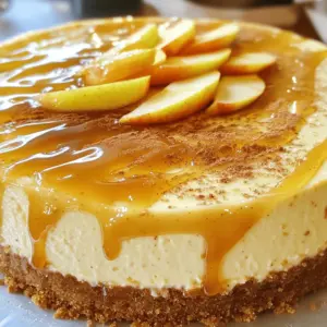 To create a delightful Apple Butter Cheesecake, gather these essential ingredients: - 1 ½ cups graham cracker crumbs - ½ cup unsalted butter, melted - 1 cup cream cheese, softened at room temperature - ½ cup granulated sugar - ½ cup apple butter (preferably homemade or artisanal) - 2 large eggs, at room temperature - 1 teaspoon pure vanilla extract - ½ teaspoon ground cinnamon - ¼ teaspoon ground nutmeg - 1 cup sour cream at room temperature - 2 tablespoons packed brown sugar - Caramel sauce, for drizzling (optional) - Fresh apple slices, for garnish You can choose homemade apple butter to enhance the flavor. Making your own is easy. Just cook down apples with sugar and spices until thick. This adds a personal touch to your cheesecake. For those with dietary restrictions, there are options. Use gluten-free graham crackers for the crust. You can swap cream cheese with a vegan alternative like cashew cream. This keeps the taste while being friendly for different diets. Check out the Full Recipe to see the complete steps. To start, I set my oven to 350°F (175°C). This step is key for a great bake. While the oven warms up, I gather my ingredients. The crust needs to be perfect. I mix 1 ½ cups of graham cracker crumbs with ½ cup of melted unsalted butter. I make sure all crumbs are coated well. Then, I press this mixture into a 9-inch springform pan. It must be firm and even. I bake the crust for 10 minutes. After that, I let it cool completely. Next, I prepare the cream cheese for the filling. I use 1 cup of cream cheese, softened at room temperature. This helps it blend smoothly. I beat it in a large bowl with an electric mixer. I mix it for about 2 to 3 minutes until creamy. Now, it’s time to make the filling. I add ½ cup of granulated sugar and ½ cup of apple butter to the cream cheese. I mix until it’s silky and well combined. Then, I add the eggs one at a time. I keep the mixer on low speed. Each egg needs to be mixed in well before adding the next. I also include 1 teaspoon of pure vanilla extract, ½ teaspoon of ground cinnamon, and ¼ teaspoon of ground nutmeg. This makes the flavor pop! After the eggs and spices are mixed in, I gently fold in 1 cup of sour cream. I use a spatula, being careful not to overmix. The filling should be smooth and creamy. I pour this mixture over the cooled crust. I spread it evenly with a spatula. I place the cheesecake in the oven and bake for 50 to 60 minutes. I check for doneness by gently shaking the pan. The center should be set but still slightly wobbly. When it looks just right, I turn off the oven. I leave the cheesecake inside for an hour to cool gradually. This step helps prevent cracks. After cooling in the oven, I take the cheesecake out. I let it cool at room temperature completely. Then, I cover it with plastic wrap and refrigerate it for at least 4 hours, or better yet, overnight. This chilling time helps the flavors meld. For the full recipe, check the section above. To make the best apple butter cheesecake, you want a smooth top. To avoid cracks, remember these tips: - Use room temperature ingredients: This helps your mixture blend well. Cold ingredients can cause lumps. - Don’t overmix: Overmixing adds air, which can lead to cracks. Mix just until combined. - Bake in a water bath: This helps keep a steady temperature. It also adds moisture to your cheesecake. For the right texture and flavor, follow these steps: - Preheat your oven: Always ensure your oven is at the right temperature. This avoids under or overcooking. - Check doneness carefully: The center should be set but still jiggle a little. It firms up as it cools. - Cool it slowly: Let the cheesecake cool in the oven. This prevents sudden temperature changes that cause cracks. Slicing your cheesecake can be tricky. Here’s how to do it right: - Use a hot knife: Dip your knife in hot water, then wipe it dry. This makes clean slices. - Chill before cutting: Cold cheesecake is easier to slice. Let it cool in the fridge for at least four hours. For a lovely presentation: - Garnish with fresh apple slices: This adds color and freshness. - Drizzle with caramel sauce: A little caramel adds sweetness and looks nice. Pair your cheesecake with drinks like: - Spiced cider: This warms up the flavors of the cheesecake. - Coffee: The bitterness balances the sweetness of the dessert. For the full recipe, check out [Full Recipe]. Enjoy making this holiday hit! {{image_4}} You can give your apple butter cheesecake a creative spin. Adding spices like ginger or cloves can enhance the flavor. A pinch of fresh ginger adds warmth and zest. Cloves bring a fragrant note that pairs well with apple. Another way to mix it up is by swirling in chocolate or caramel. This adds a rich, decadent touch. Simply drizzle melted chocolate or caramel into the cheesecake batter before baking. Use a knife to swirl it gently. This creates a beautiful marbled effect while adding depth to the flavor. If you need a gluten-free option, swap the graham cracker crust for a nut-based crust. Almond flour or crushed gluten-free cookies work well. Mix with melted butter and press into the pan as you would with the original crust. For a vegan version, replace the cream cheese with a plant-based alternative. Use silken tofu blended until smooth. Substitute eggs with flax eggs or applesauce. This keeps the cheesecake creamy without dairy. You can also use coconut cream for a rich texture. These changes make this dessert friendly for everyone. These variations keep the spirit of the dish while catering to different tastes and diets. Try them out to find your favorite twist! For the full recipe, check out the [Full Recipe]. To keep your apple butter cheesecake fresh, cover it well. Use plastic wrap or foil to seal it tightly. This helps prevent it from drying out and keeps it tasty. Place it in the fridge where it can stay good for about five days. If you want to save it for longer, freezing is a great option. For freezing, slice the cheesecake first. Wrap each slice in plastic wrap, then place them in a freezer-safe bag. This way, you can grab a piece anytime. Frozen cheesecake lasts about two to three months. Just make sure to label the bag with the date. If you want to revive your cheesecake after freezing, thaw it in the fridge overnight. This keeps the texture smooth. You can also let it sit at room temperature for about 30 minutes before serving. When serving, enjoy it chilled for a refreshing bite. If you prefer a softer texture, let it warm up slightly. This cheesecake shines at any temperature, so choose what you love best. For more delicious options, check out the Full Recipe. How long can I store the cheesecake? You can store your apple butter cheesecake in the fridge for about five days. Make sure to cover it well with plastic wrap. This keeps it fresh and tasty. If you want to keep it longer, you can freeze it for up to two months. Just wrap it tightly to prevent freezer burn. Can I make this cheesecake in advance for holidays? Yes, you can make this cheesecake a day or two ahead of time. This actually helps the flavors shine! Just make sure to chill it well in the fridge. When you’re ready to serve, add your toppings for a fresh look. What to do if the cheesecake cracks? If your cheesecake cracks, don’t worry. This can happen to anyone. You can cover the cracks with toppings like caramel or whipped cream. If you catch it early, you can also try baking it at a lower temperature next time to help prevent this. Why is my cheesecake not setting properly? If your cheesecake isn’t setting, it may need more time in the oven. The center should be a little wobbly when done. After baking, let it cool in the oven to avoid sudden temperature changes. This helps it set nicely. Apple Butter Cheesecake is a delightful treat that combines rich flavors and textures. We covered essential ingredients, tips for baking, and ways to avoid common issues. Consider flavor twists or dietary variations to make it your own. Remember to store your cheesecake properly and refresh it when needed. Enjoying every bite is key, and with these tips, you're set for success. Happy baking!