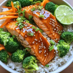 - 2 salmon fillets (about 6 oz each) - 1 cup cooked jasmine rice (or any white rice) - 4 tablespoons teriyaki sauce - 1 tablespoon sesame oil - 1 cup fresh broccoli florets - 1 medium carrot, julienned - 2 green onions, thinly sliced - 1 tablespoon sesame seeds (for garnish) - Salt and freshly ground black pepper, to taste You can swap salmon for chicken or tofu. Both work well with teriyaki sauce. For rice, use brown rice if you want more fiber. Broccoli can be replaced with snap peas or bell peppers. Carrots can be left out or replaced with zucchini. This dish is rich in protein and healthy fats. Each serving has about 400 calories. It provides essential vitamins from the vegetables. Salmon offers omega-3 fatty acids, great for heart health. The meal is balanced with carbs from rice and fiber from veggies. Start by cooking your jasmine rice if it's not already done. You want it warm for the bowls. Next, rinse the fresh broccoli florets under cold water. This step keeps them crisp and fresh. Then, julienne the carrot into thin strips. Aim for matchstick sizes so they cook evenly. Heat the sesame oil in a medium pan over medium heat. Once hot, add your broccoli and julienned carrots. Sauté them for about 3-4 minutes. You want them tender yet still crisp. Season lightly with salt and black pepper. After cooking, set the vegetables aside on a plate. In the same pan, place the salmon fillets skin-side down. Cook for about 2-3 minutes until you see a nice crust. Gently flip the fillets to the other side. Pour the teriyaki sauce over the salmon. Let it cook for another 3 minutes. This lets the sauce caramelize on the fish. Grab your serving bowls and divide the warm jasmine rice as the base. Place a salmon fillet on top of each rice portion. Spoon any leftover teriyaki sauce from the pan over the salmon. This adds flavor and makes the dish shine! Pile the sautéed broccoli and carrots on top of the salmon. Finally, sprinkle sliced green onions and sesame seeds for a crunchy finish. Enjoy your beautiful bowls! To make great teriyaki salmon, start with fresh fillets. Look for bright color and firm texture. This ensures flavor and quality. Cooking time is key. Cook the salmon skin-side down first. This helps keep it moist. A crispy skin adds texture, which is nice. Pour teriyaki sauce over the salmon to glaze it. This adds sweetness and depth. Jasmine rice is my go-to choice for this dish. It has a lovely scent and soft texture. You can also use white rice or brown rice if you prefer. Cook it ahead of time for ease. You can even use leftover rice. Make sure it’s warm when you serve. This helps the salmon flavors mix well with the rice. Garnishes can elevate your rice bowl. Thinly sliced green onions add freshness and color. Sesame seeds give a nice crunch. You can add lime wedges for a zesty kick. A drizzle of extra teriyaki sauce on top is also a great idea. These little touches make your meal look and taste better. {{image_4}} You can swap salmon for chicken or tofu. Both options work well. Chicken fillets cook nicely with teriyaki sauce. Use about 6 oz of chicken breast. Cook it the same way as salmon. For tofu, use firm tofu. Press it to remove excess water. Cut it into cubes and sauté it in sesame oil. Cook until golden brown for great flavor. Mix and match your vegetables for variety. Try bell peppers, snap peas, or zucchini. Bell peppers add a nice crunch and color. Snap peas bring sweetness and freshness. Zucchini cooks quickly and absorbs flavors well. Just remember to cut them into small pieces for even cooking. You can also use spinach or bok choy for a nutrient boost. To make this dish gluten-free, choose gluten-free teriyaki sauce. Many brands offer great gluten-free options. Check the label to be sure. For rice, jasmine rice is naturally gluten-free. You can also use brown rice or quinoa. Both options add extra fiber to your meal. Enjoy this dish without worry about gluten! To keep your teriyaki salmon rice bowls fresh, store leftovers in an airtight container. Place the salmon, rice, and veggies together. This way, flavors blend well. Keep them in the fridge for up to three days. If you plan to eat them soon, don’t mix the rice and salmon until you’re ready to serve. This keeps the rice fluffy and the salmon moist. When it's time to enjoy your leftovers, heat them gently. You can use a microwave or a stove. For the microwave, place the food in a bowl. Cover it with a damp paper towel. Heat on medium power for 1-2 minutes, checking often. On the stove, use a non-stick pan over low heat. Add a splash of water to keep it moist. Stir until heated through, about 3-5 minutes. If you want to save your rice bowls for later, freezing is a great option. First, let the dish cool completely. Then, separate the salmon, rice, and veggies into different containers. This keeps everything fresh. Use freezer-safe bags or containers. They can stay in the freezer for up to one month. When you're ready to eat, thaw overnight in the fridge before reheating. You can tell salmon is cooked when it turns from bright pink to a light, opaque color. The flesh should flake easily with a fork. If you have a meat thermometer, the internal temperature should reach 145°F. Always trust your senses; if it looks and feels done, it likely is! Yes, you can make teriyaki sauce at home! Combine soy sauce, honey, garlic, and ginger for a simple version. Mix equal parts soy sauce and honey, then add minced garlic and ginger. Simmer until thickened. This homemade sauce is fresh and can be adjusted to your taste! Jasmine rice is a great choice for teriyaki bowls due to its fragrant nature and fluffy texture. You can also use sushi rice or basmati rice if you prefer. Both options hold up well under the salmon and sauce. Absolutely! These teriyaki salmon rice bowls are perfect for meal prep. You can cook the salmon and veggies ahead of time and store them in separate containers. Just reheat before serving. Keep the rice warm, and enjoy a quick and tasty meal all week! This blog post covered how to make teriyaki salmon bowls. We talked about the right ingredients and good swaps. You learned step-by-step how to prepare, cook, and assemble your dish. We shared tips to get the best flavor and texture. The recipe can also be varied with different proteins, veggies, and storage methods. By following these guidelines, you can create tasty and healthy meals. Enjoy the cooking process and the delicious bowls you’ll share.