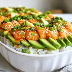 - 2 cups sushi rice - 2 &frac12; cups water - 1 tablespoon rice vinegar - 1 tablespoon sugar - 1 teaspoon salt - 8 ounces fresh salmon, skinless and finely chopped - 2 tablespoons sriracha sauce - 2 tablespoons mayonnaise - 1 ripe avocado, thinly sliced - 1 cucumber, julienned - 2 green onions, finely sliced - 1 sheet nori, cut into small squares - Toasted sesame seeds for garnish You can swap fresh salmon for canned salmon or tuna. This works well if you are short on time. For a lighter touch, use Greek yogurt instead of mayonnaise. It adds creaminess without too much fat. When it comes to rice, short-grain rice is best for sushi. If you can't find it, try medium-grain rice as a substitute. {{ingredient_image_2}} First, rinse the sushi rice. Place it in a bowl and run cold water over it. Keep rinsing until the water runs clear. This step removes extra starch. It helps the rice cook well. Next, cook the rice. In a medium saucepan, add the rinsed rice and water. Bring it to a boil on medium-high heat. Once boiling, lower the heat to low and cover the pan. Let it simmer for about 18 minutes. The water should be fully absorbed, and the rice should be tender. After cooking, take the pan off the heat. Keep it covered for ten more minutes. This steaming step makes the rice fluffy. In a small bowl, mix rice vinegar, sugar, and salt. Whisk until dissolved. Fluff the rice with a fork and fold in the vinegar mix. Set the rice aside to cool. Now, let&rsquo;s make the spicy salmon mixture. Take a mixing bowl and add chopped salmon. Then, pour in the sriracha sauce and mayonnaise. Stir it well until everything blends smoothly. This mix gives your sushi bake its kick! Time to assemble! Grab a baking dish and spread an even layer of the cooled sushi rice on the bottom. Press it down gently to form a base. Next, spread the spicy salmon mixture evenly over the rice. Make sure all the rice gets covered. Preheat your oven to 400&deg;F (200&deg;C). Place the baking dish in the oven. Bake for 15 to 20 minutes. The salmon should turn opaque and be fully cooked. Once baked, take the dish out and let it cool for a few minutes. Finally, garnish the dish with sliced avocado, julienned cucumber, and chopped green onions. Sprinkle toasted sesame seeds on top for a nice finish. Enjoy your spicy salmon sushi bake warm! To make a great sushi bake, focus on the rice. Start with rinsing the sushi rice. Rinse it under cold water until the water runs clear. This step removes extra starch and helps the rice cook well. After rinsing, boil it in water. The rice should be sticky yet fluffy when cooked. Next, let's talk about the salmon. Use fresh salmon for the best flavor. Make sure to chop it finely. This helps it cook evenly. When you mix the salmon with sriracha and mayonnaise, combine them well. This mix gives the dish a creamy texture and a spicy kick. Presentation matters. Use a nice baking dish to show off your sushi bake. After baking, add toppings like avocado, cucumber, and green onions. These give color and crunch. Serve nori squares on the side. You can wrap bites in the nori or crumble it on top for added flavor. Pair your sushi bake with pickled ginger and soy sauce. These sides enhance the taste. They balance the spiciness of the dish and add layers of flavor. One big mistake is overcooking the salmon. Keep an eye on it while it bakes. Salmon should be opaque but still moist. Check it around the 15-minute mark. Another mistake is skipping the rice rinsing. This step is key for perfect rice. Not rinsing can lead to mushy or sticky rice, which won't hold up well in the bake. Take the time to rinse; your sushi bake will thank you! Pro Tips Perfectly Cooked Rice: Rinse your sushi rice thoroughly to remove excess starch, which helps achieve a perfect sticky texture that holds together well. Fresh Salmon Selection: Choose high-quality, sushi-grade salmon for the best flavor and safety. Always check for freshness and odor before purchasing. Spice Level Control: Adjust the amount of sriracha to suit your taste. If you're sensitive to spice, start with a smaller amount and gradually increase. Serving Suggestions: Serve with soy sauce, pickled ginger, and wasabi on the side for an authentic sushi experience that enhances the flavors. {{image_4}} You can change the spice level to fit your taste. Try using less sriracha for a mild flavor. If you want more heat, add chili paste or fresh jalape&ntilde;os. You can also switch up the seafood. Shrimp and crab work great in this recipe. Just chop them finely and mix them with the sauces. If you prefer plant-based meals, you have options. Use cooked tofu or tempeh instead of salmon. You can also add more veggies like bell peppers or carrots. For a veggie sushi bake, layer your rice with these ingredients. Top it off with avocado and cucumber for a fresh taste. Toppings can take your sushi bake to the next level. Try sprinkling furikake on top for extra umami flavor. You can also add chili flakes for a spicy kick. Other great options include sliced radishes or sesame seeds. These toppings add crunch and flavor to your dish. To keep your spicy salmon sushi bake fresh, refrigerate it right away. Place it in an airtight container. Make sure it's sealed tight to prevent air from getting in. This will help keep the flavors intact. The sushi bake lasts about 2 to 3 days in the fridge. After that, it might not taste as good. When you want to enjoy leftovers, reheating is easy. You can use an oven or a microwave. If using an oven, preheat to 350&deg;F (175&deg;C). Cover the dish with foil to avoid drying it out. Heat for about 10-15 minutes. For the microwave, place a portion on a microwave-safe plate. Add a small splash of water to keep it moist. Heat in short bursts of 30 seconds until warm. This method helps maintain the texture and flavor. Enjoy your meal just like the first time! Yes, you can freeze Spicy Salmon Sushi Bake. To freeze, let it cool first. Cut it into portions. Wrap each piece tightly in plastic wrap. Then place them in a freezer bag. When you're ready to enjoy it, take it out. Thaw it overnight in the fridge. Reheat in the oven at 350&deg;F (175&deg;C) until warm. If you don't have sushi rice, you can use short-grain rice or jasmine rice. Both types can work well in this recipe. They hold moisture and shape nicely. Quinoa is another option, though it changes the texture. Just adjust the cooking method accordingly for these alternatives. To adjust the spice level, you can add more or less sriracha. Start with a small amount and taste as you mix. If you want less heat, reduce the sriracha. You can also add more mayonnaise for creaminess. For extra heat, mix in chili flakes or hot sauce when serving. This recipe can be gluten-free if you choose the right ingredients. The sushi rice and fresh salmon are gluten-free. However, ensure the sriracha and mayonnaise are gluten-free too. Some brands add gluten. Always check the labels before using them. In this article, we covered how to make a Spicy Salmon Sushi Bake, from key ingredients to step-by-step instructions. We explored tips for perfect texture, common mistakes to avoid, and delicious variations. Remember, adjusting the spice level and using substitutes can make this dish work for everyone. Enjoy experimenting with toppings and serving suggestions to make it your own. Your sushi bake journey is just beginning, and I hope you feel inspired to create a dish your whole family will love.