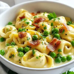 To make a tasty Minute Tortellini Carbonara, gather these essential ingredients: - 15 oz package of refrigerated tortellini (cheese or spinach-filled) - 2 large eggs (at room temperature) - 1 cup finely grated Parmesan cheese - 5 strips of turkey bacon or plant-based bacon (chopped) - 2 cloves garlic (minced) - 1 cup frozen peas (thawed) - Salt and fresh cracked pepper (to taste) - Fresh parsley (chopped, for garnish) - Zest of 1 lemon (for added flavor) These ingredients create a rich and creamy dish that everyone will love. You can elevate your carbonara with some optional items: - Red pepper flakes (for a spicy kick) - Fresh basil leaves (for a fragrant touch) - Extra lemon zest (for more brightness) These additions can bring new flavors to your plate. When picking tortellini, consider these tips: - Choose stuffed tortellini for more flavor. Cheese or spinach are great options. - Check the package for freshness. Refrigerated options often taste better. - If you prefer a lighter dish, look for whole wheat or gluten-free tortellini. Making the right choice will set the stage for a delicious meal. {{ingredient_image_2}} To start, fill a large pot with water and add salt. Bring it to a boil. Once boiling, carefully add the tortellini. Cook them based on the package directions, usually around 3-5 minutes. You want them to be al dente. Before draining, remember to save 1 cup of the pasta water. This water helps to make your sauce creamy later. After saving the water, drain the tortellini and set them aside. While your tortellini cooks, grab a large skillet. Set it over medium heat. Add the chopped turkey bacon to the skillet. Let it cook until it turns crispy and golden brown, which takes about 5-7 minutes. Stir it often to ensure it cooks evenly. Once crispy, it&rsquo;s time to add flavor. In a medium bowl, whisk together the eggs and Parmesan cheese. Mix them until they are smooth. Now, take a few tablespoons of the hot pasta water and add it slowly to the egg mixture. While adding the water, keep whisking. This step is important to avoid scrambling the eggs. You want a nice, creamy sauce. After that, combine the drained tortellini with the bacon and garlic in the skillet. Remove the skillet from the heat. Quickly pour the egg and cheese mix over the tortellini. Toss everything gently to combine. The heat will cook the egg mixture, making a silky sauce. If the sauce seems thick, add more pasta water until it reaches your desired creaminess. To make the sauce creamy, you need the right method. Start with warm pasta water. This helps mix the sauce without cooking the eggs too fast. When you whisk the eggs, add the hot water slowly. This step keeps your sauce smooth. If it feels thick, add more reserved water bit by bit. Taste is key in cooking. For more flavor, use fresh herbs. Basil or thyme can bring a fresh taste. The lemon zest adds brightness, but you can add more if needed. Salt and pepper are also important. Adjust to your liking for the best dish. Want to save time? Choose pre-chopped veggies or frozen peas. They cut down prep time and still taste great. Cook the tortellini while you prepare the sauce. This way, you finish quicker. Once you get the hang of it, this dish will be on your table in no time. Pro Tips Use Fresh Ingredients: For the best flavor, opt for fresh garlic and high-quality Parmesan cheese. This will significantly enhance the overall taste of your carbonara. Control the Heat: Make sure to remove the skillet from the heat before adding the egg mixture. This prevents the eggs from scrambling and ensures a creamy sauce consistency. Perfect Pasta Water: The reserved pasta water is your secret weapon. Use it to adjust the sauce's consistency, making it as creamy or as light as you prefer. Customize Your Bacon: Feel free to use regular bacon or a different type of meat if you prefer. Just ensure it is crispy to add the right texture to the dish. {{image_4}} You can easily make a vegetarian version of this dish. Just swap the turkey bacon for mushrooms or smoked tofu. Both options give a nice, umami flavor. Use cheese tortellini for a creamy base. Add some saut&eacute;ed spinach or kale for extra greens. This keeps the dish light and fresh while still being satisfying. If you need a gluten-free meal, choose gluten-free tortellini. Many brands offer great pasta made from rice or chickpeas. Look for certified gluten-free labels. Be sure to check your bacon too. Use turkey bacon or plant-based bacon that is gluten-free. This way, you can enjoy the dish without worry. Boost the flavor by adding more veggies or spices. Try adding diced bell peppers or zucchini for color and nutrition. Fresh herbs like basil or thyme can also brighten the dish. A pinch of red pepper flakes adds a nice kick. If you want more zest, add extra lemon juice or zest for a fresh taste. These small changes can elevate your Minute Tortellini Carbonara to a new level! After enjoying your Minute Tortellini Carbonara, store any leftovers in an airtight container. Let the dish cool down to room temperature before sealing it. This helps prevent condensation, which can make the pasta soggy. Keep it in the fridge for up to 3 days. To reheat, add the leftover tortellini to a skillet over low heat. You can add a splash of water or broth to keep it moist. Stir gently to warm everything without overcooking. You can also use the microwave. Place it in a microwave-safe bowl, cover it, and heat in short bursts, stirring in between. If you want to save some for later, you can freeze the tortellini carbonara. Scoop portions into freezer-safe containers, leaving some space for expansion. Seal tightly and label with the date. It can last up to 2 months in the freezer. When ready to eat, thaw it in the fridge overnight before reheating. Yes, you can use frozen tortellini. Just cook it according to the package directions. This makes it easy to enjoy a quick meal. Frozen tortellini tastes great, so don&rsquo;t worry about flavor. Simply adjust the cooking time if needed. If you want a substitute for bacon, try pancetta or turkey bacon. You can also use mushrooms for a vegetarian option. They will add a nice umami flavor. Another choice is plant-based bacon for a healthier twist. To stop the sauce from scrambling, whisk the egg and cheese mixture well. Gradually add hot pasta water while whisking. This warms the eggs slowly, making it creamy. Remember to remove the skillet from heat before adding the sauce. This will help keep it silky. You can prepare the tortellini and sauce ahead of time but store them separately. Mix them just before serving to keep everything fresh. Reheat gently on the stove, adding a splash of water if needed. This keeps the dish creamy and tasty. In this blog post, I covered the key ingredients for Tortellini Carbonara and outlined how to cook it step-by-step. We explored tips to make the sauce perfect and discussed variations to fit different diets. Storing leftovers and reheating tips were also shared. Cooking this dish can be fun and rewarding. With these simple steps, you can impress anyone at your table. Now, gather your ingredients and enjoy making your own delicious Tortellini Carbonara!