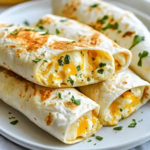 - 2 cups cooked chicken, shredded - 1 cup shredded mozzarella cheese - 1/2 cup cream cheese, softened - 4 large flour tortillas - 1/2 cup diced bell peppers - Fresh spinach - 2 cloves garlic, minced - 1/4 cup fresh parsley, finely chopped - 1 teaspoon paprika - 1/2 teaspoon salt - 1/2 teaspoon black pepper - 1 tablespoon olive oil for cooking The main ingredients create the tasty base for these wraps. Cooked chicken gives protein and heartiness. Shredded mozzarella brings gooey, melty goodness. Cream cheese adds creaminess and binds everything together. Flour tortillas wrap it all up perfectly. You can add diced bell peppers for crunch and color. Fresh spinach boosts the nutrition and adds a nice touch. These add-ins are not required but can make your wraps even better. Seasoning is key. Minced garlic adds a strong, rich flavor. Fresh parsley brings a pop of color and freshness. Paprika gives warmth and a hint of smokiness. Salt and black pepper enhance all the flavors. Finally, olive oil is great for cooking the wraps to golden perfection. Use these ingredients to make your Cheesy Garlic Chicken Wraps flavorful and fun! {{ingredient_image_2}} Start by mixing the chicken and cheese in a bowl. You need 2 cups of cooked chicken, shredded. Add 1 cup of shredded mozzarella cheese and 1/2 cup of softened cream cheese. This mix creates a creamy filling. Next, add flavor with garlic and spices. Mince 2 cloves of garlic and toss them into the bowl. Then add 1/4 cup of finely chopped parsley, 1 teaspoon of paprika, 1/2 teaspoon of salt, and 1/2 teaspoon of black pepper. Mix everything well. You want a smooth and tasty filling. Now, lay out the tortillas on a clean surface. You will use 4 large flour tortillas. With a spoon, distribute the filling evenly. Place it along the center of each tortilla. If you want more crunch and color, add diced bell peppers or fresh spinach. Sprinkle this on top of the filling before you wrap. Heat a skillet on medium heat. Add 1 tablespoon of olive oil and let it warm up. Once hot, place the wraps seam-side down in the skillet. Cook them for 3-4 minutes. They should turn golden brown and crispy. After that, use tongs to flip the wraps. Cook the other side for another 3-4 minutes. Look for melted cheese seeping out as a sign they are ready. Remove the wraps from the skillet. Let them cool for a minute. Then slice each wrap in half diagonally. This makes for a nice presentation. Enjoy your cheesy garlic chicken wraps! To amp up the cheese flavor, try mixing in different types of cheese. You can use sharp cheddar, pepper jack, or even gouda. These cheeses melt well and add a rich taste. If you want a fun twist, add cream cheese to your filling. It makes everything super creamy and tasty. You can also mix in some crumbled feta or goat cheese for a tangy touch. For crispy wraps, heat your skillet well before cooking. Use medium heat and add enough olive oil to coat the bottom. This will help the wraps turn golden brown. Don&rsquo;t overcrowd the skillet. Cook a few wraps at a time for even cooking. After flipping, cook until the cheese melts and the outside is crispy. Let the wraps cool for a minute before cutting. This helps keep the filling from spilling out. Dips and sauces can make your wraps even better. Try serving them with ranch dressing, marinara, or garlic aioli. These flavors pair well with the cheesy filling. You can also sprinkle fresh herbs on top, like parsley or basil, for extra color and taste. If you like heat, add hot sauce or sriracha on the side. Pro Tips Use Fresh Ingredients: Fresh garlic and herbs will elevate the flavor of your wraps significantly. Always opt for fresh parsley and minced garlic instead of dried alternatives for a more vibrant taste. Experiment with Cheese: While mozzarella works great, try mixing in other cheeses like cheddar or pepper jack for a different flavor profile. This can add a nice kick to your wraps. Warm Tortillas: Before filling, warm the tortillas slightly in the microwave or a dry skillet. This will make them more pliable and easier to roll without tearing. Don&rsquo;t Overfill: While it can be tempting to pack the wraps with extra filling, overfilling can make them difficult to roll and can lead to spills while cooking. Stick to a generous yet manageable amount. {{image_4}} You can change the flavor of your cheesy garlic chicken wraps easily. Try using different cheese options. Cheddar cheese adds a sharp taste. Pepper jack gives a spicy kick. You can even mix cheeses for a fun twist. For extra flavor, switch up the spices. Try adding red pepper flakes for heat. Cajun seasoning can bring a bold taste. Experiment with your favorite spices to find what you love. If you need gluten-free options, use gluten-free tortillas. They work well with the filling. You won't miss the regular tortillas at all. For a vegetarian version, swap the chicken for beans. Black beans or chickpeas can add protein. You can also use grilled mushrooms for a meaty texture. Fresh vegetables can brighten your wraps. In spring or summer, add fresh spinach or diced tomatoes. These add color and nutrients. During the hot months, create a summer version. Use grilled zucchini and corn. They add a fresh taste and crunch. These simple changes make your wraps exciting all year round. To store leftovers, let the wraps cool first. Place them in an airtight container. This keeps them fresh for up to three days. If you want to keep them longer, avoid stacking them. This prevents sogginess. You can also wrap each one in plastic wrap for better protection. You can freeze these wraps before or after cooking. To freeze before cooking, assemble the wraps and place them in a single layer on a baking tray. Once they are frozen, transfer them to a freezer bag. They will last for up to two months. To freeze after cooking, let them cool completely. Then, wrap each one tightly in plastic wrap and place them in a freezer bag. For the best taste, reheat the wraps in a skillet. Heat it on medium-low. Add a little oil to keep them crispy. Cook each side for about 3-4 minutes until heated through. If you use a microwave, place a damp paper towel over the wrap. This helps keep it moist but may make it less crispy. Enjoy your cheesy garlic chicken wraps warm for the best experience! Yes, you can use raw chicken. Here&rsquo;s how to prepare it: - Start with 2 cups of raw chicken breast. - Cut the chicken into small cubes. - Heat a skillet over medium heat and add 1 tablespoon of olive oil. - Cook the chicken for about 6-8 minutes until it is no longer pink. - Once cooked, shred the chicken and mix it with the cheeses and spices as in the recipe. To add spice, try these options: - Add 1 teaspoon of cayenne pepper to the filling. - Mix in chopped jalape&ntilde;os for a fresh kick. - Serve with a spicy dipping sauce like sriracha or hot sauce. - Try a sprinkle of crushed red pepper flakes on top before serving. These small changes will give your wraps a tasty heat! Here are some great side dishes to serve: - A fresh garden salad with a light dressing. - Crispy sweet potato fries for a fun crunch. - Steamed veggies like broccoli or green beans. - A bowl of creamy ranch or marinara for dipping. - Chips and salsa for a casual vibe. These sides will balance the flavors and make your meal more enjoyable! This blog post detailed how to make cheesy garlic chicken wraps using simple ingredients and easy steps. We explored the main items like shredded chicken and cheese, seasonal changes, and tips for perfecting your dish. Remember, you can personalize your wraps with fresh veggies or spices. Enjoy your time cooking these delicious wraps. They are perfect for any meal. Keep experimenting and make them your own! Happy cooking!