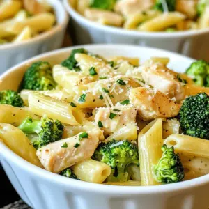 To make a tasty Chicken and Broccoli Pasta Skillet, you'll need a few key ingredients. Here&rsquo;s what you should gather: - 2 cups pasta (penne or fusilli) - 1 lb chicken breast, cubed - 2 cups fresh broccoli florets - 3 cloves garlic, minced - 1 cup low-sodium chicken broth - 1 cup heavy cream - 1 teaspoon Italian seasoning - 1 cup grated Parmesan cheese - 2 tablespoons olive oil - Salt and pepper to taste - Fresh parsley for garnish These ingredients create a rich and creamy dish. The chicken brings protein, while broccoli adds color and nutrients. Pasta binds everything together, making it a filling meal. The garlic and Italian seasoning enhance the flavors, creating a comforting dish. Don't forget the Parmesan cheese; it adds a delicious umami taste. Gathering these ingredients sets you up for a successful cooking experience. Enjoy the process and have fun in the kitchen! {{ingredient_image_2}} First, we saut&eacute; the chicken. Heat 2 tablespoons of olive oil in a large skillet over medium-high heat. When the oil is hot, add 1 pound of cubed chicken breast. Season it with salt and pepper. Cook the chicken for about 5-7 minutes. Stir it often until it is browned and cooked through. Once done, remove the chicken and set it aside on a plate. Next, we need to saut&eacute; the garlic. In the same skillet, turn the heat down to medium. Add 3 minced garlic cloves. Saut&eacute; them for 1 minute until they smell great. Be careful not to burn them. Now, pour in 1 cup of low-sodium chicken broth. Bring it to a gentle simmer. Add 2 cups of fresh broccoli florets and cook for 3-4 minutes. The broccoli should be bright green and tender. Now, it&rsquo;s time to add cream and seasoning. Stir in 1 cup of heavy cream and 1 teaspoon of Italian seasoning. Let this mixture heat up. While it simmers, cook 2 cups of pasta in a separate pot. Follow the package instructions until the pasta is al dente. Drain the pasta and set it aside. Next, add the drained pasta to the skillet along with the cooked chicken. Mix everything carefully until coated with the creamy sauce. For the final touches, sprinkle in 1 cup of grated Parmesan cheese. Stir until the cheese melts and the dish becomes creamy. Taste your dish and adjust the seasoning with salt and pepper if needed. Remove the skillet from the heat. Let it sit for a few minutes to thicken. Serve the pasta hot in deep bowls. Garnish with chopped parsley and extra Parmesan for a lovely touch. To get a golden-brown crust, use medium-high heat. This helps the chicken brown nicely. Make sure to space the chicken cubes out in the skillet. If they are too close, they will steam instead of sear. Cook the chicken for 5 to 7 minutes until it's no longer pink inside. Avoid overcooking by checking it often. Overcooked chicken can be dry and tough. To ensure the sauce is creamy, use heavy cream. Add it after cooking the garlic and broccoli. Stir slowly to mix it well with the broth. Season the sauce with salt and freshly ground black pepper. Adding Italian seasoning will enhance the flavor. Taste the sauce before serving. Adjust the seasoning as needed for the best taste. Cook the pasta according to the package instructions. Aim for al dente, which means it should be firm but cooked. Timing is key here. Start cooking the pasta while you make the sauce. This saves time and keeps everything warm. For this dish, penne or fusilli works best. These shapes hold the sauce well, giving you a tasty bite every time. Pro Tips Perfect Pasta: To achieve the best texture, cook the pasta just until al dente. It will continue to cook slightly when mixed with the hot sauce. Broccoli Brightness: To keep broccoli vibrant and green, avoid overcooking. It should be tender but still crisp when added to the dish. Cheese Choice: For a richer flavor, consider using aged Parmesan or Pecorino Romano instead of regular Parmesan cheese. Flavor Boost: Add a splash of lemon juice or a pinch of red pepper flakes for an extra layer of flavor and a bit of heat. {{image_4}} You can switch out chicken for shrimp or tofu. Shrimp cooks fast, about 3-5 minutes. Tofu needs a bit more time. Cook it until it's golden brown, usually around 7-10 minutes. This way, you keep the dish tasty and healthy. Add other veggies like bell peppers, spinach, or peas. They add color and fresh flavor. Just cut them into small pieces so they cook evenly. If you add more veggies, you may need to cook them a little longer. Check for doneness after 5-7 minutes. Boost the taste with spices like red pepper flakes or fresh herbs. Basil or oregano can really brighten the dish. For cheese, try mozzarella or gouda for a different twist. Just remember to melt it slowly to keep it creamy and smooth. To store leftovers, let the Chicken and Broccoli Pasta cool first. Place it in an airtight container. This prevents air from making it dry. You can keep it in the fridge for up to three days. For best flavor, eat it within two days. The best containers for storage are glass or BPA-free plastic. Glass containers help keep food fresh. They also make it easy to see what's inside. For reheating, use a skillet or microwave. A skillet works best to keep the dish creamy. Heat it on low to medium heat. Stir often to avoid sticking. If using a microwave, place a serving in a bowl. Cover it with a damp paper towel. Heat it for 1 to 2 minutes. Stir halfway to heat evenly. The dish should be hot, around 165&deg;F. Enjoy your meal again! To make this Chicken and Broccoli Pasta Skillet gluten-free, swap regular pasta for gluten-free options. You can use gluten-free penne or fusilli. These pasta types hold up well in the dish and taste great too. Yes, you can use frozen broccoli in this recipe. Just know that frozen broccoli takes longer to cook. Simmer it for about 5 to 6 minutes until it's tender. This way, it will still taste fresh and vibrant. If you want to spice things up, add red pepper flakes. Start with a pinch and adjust as you like. You can also use diced jalape&ntilde;os for a fresh kick. Both options will add great heat to your dish. To prevent pasta from sticking, stir it often while it cooks. Use plenty of water in the pot and add a pinch of salt. After draining, toss the pasta with a little olive oil. This keeps it from clumping together. This blog post covers a rich chicken pasta recipe that&rsquo;s simple and tasty. You learned how to cook chicken and saut&eacute; garlic and broccoli for a creamy sauce. I shared tips on cooking pasta perfectly and how to store leftovers. You can also try different proteins and veggies to make this dish your own. Cooking at home can be fun and rewarding. By using these steps, you&rsquo;ll impress your family and friends. Enjoy your meal!